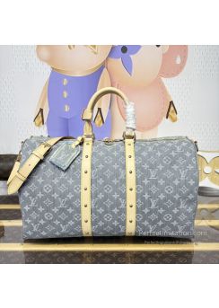 lv-grey-monogram-duffle-bag-with-tan-studded-trim-pilvj01427-01