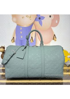lv-pale-blue-embossed-monogram-duffle-bag-pilvj01598-01