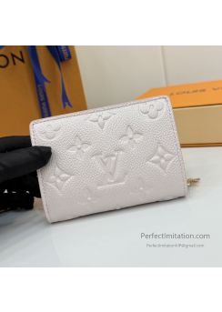 lv-pale-pink-embossed-monogram-folded-zip-wallet-pilvj01585-01