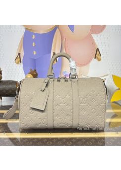 lv-taupe-embossed-monogram-duffle-bag-pilvj01428-01