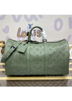 lv-olive-embossed-monogram-duffle-bag-pilvj01605-01