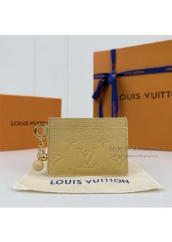 lv-pale-yellow-embossed-monogram-card-holder-pilvj01571-01